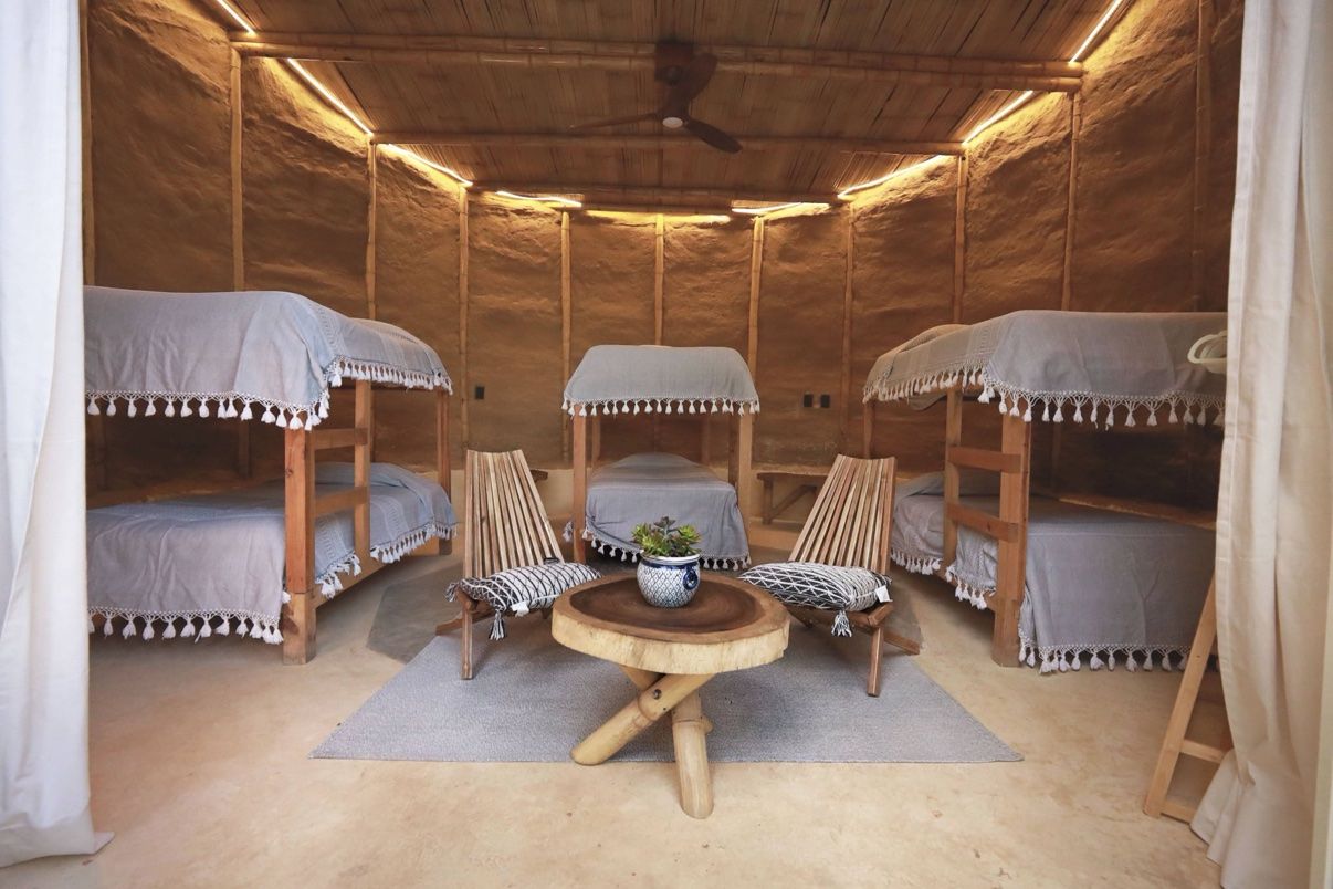 The dorm room with three bunk beds
